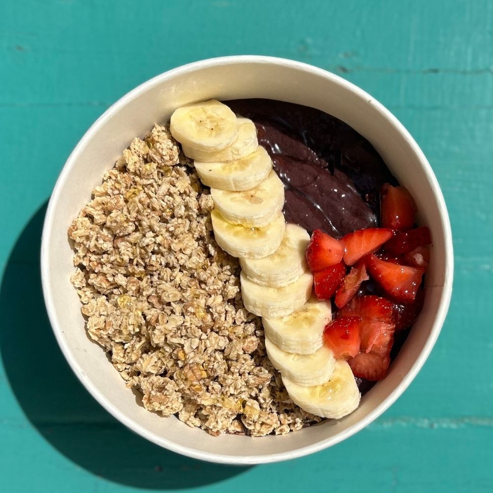 Original açai bowl with granola, banana, strawberries and honey at Very Açai in Rome